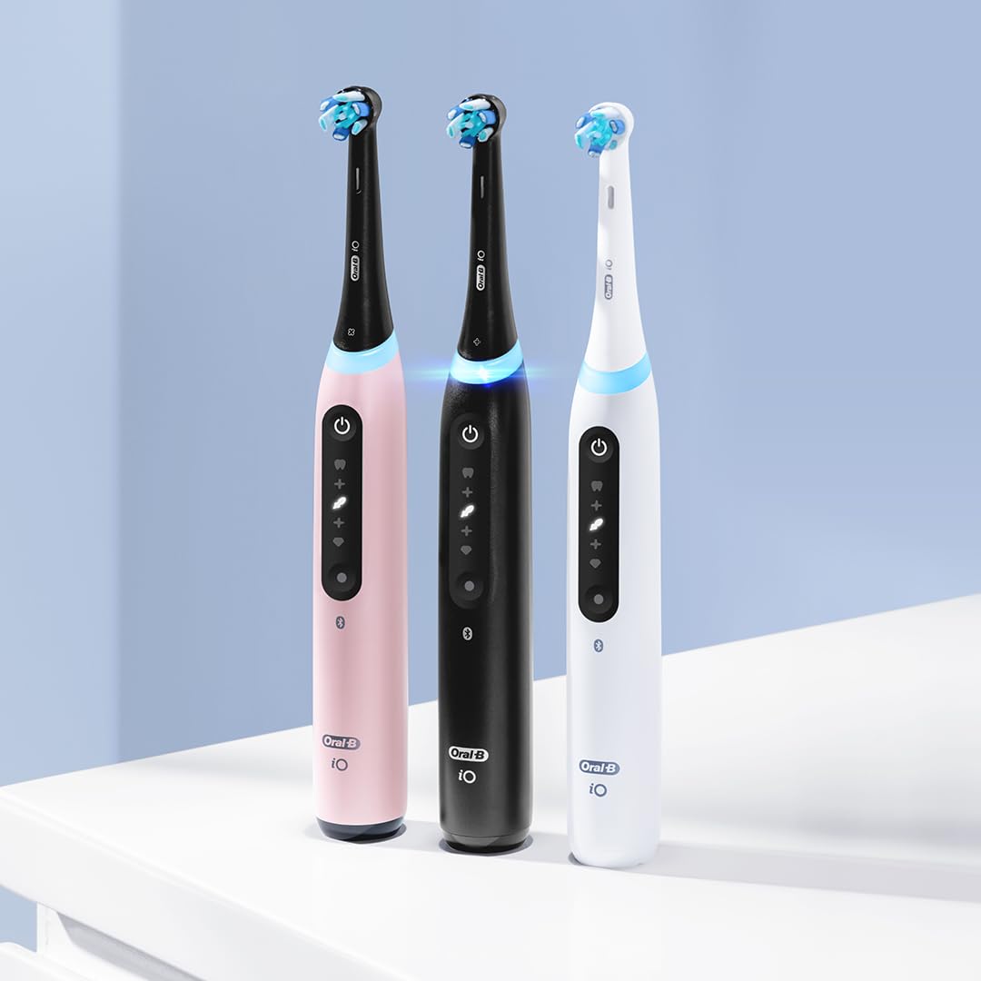 Oral-B iO Series 5 Rechargeable Electric Toothbrush with Visible Pressure Sensor to Protect Gums, 2 Minute Timer, 5 Cleaning Settings, 1 Replacement Toothbrush Heads, and Travel Case, White
