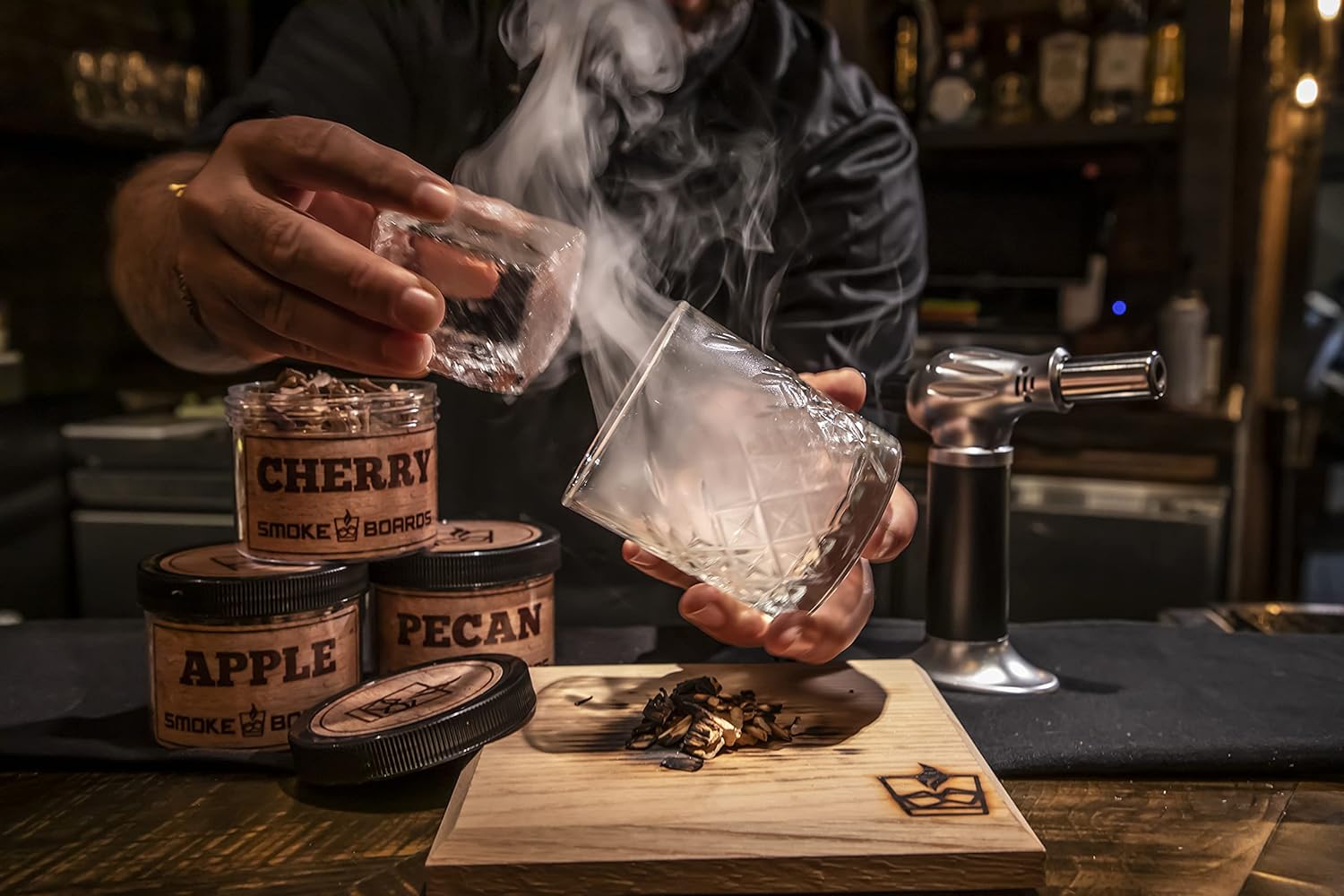 Smoked Cocktail Kit. The only Complete 7 Piece Home Bartender Kit with Carrying case and Torch Included! Handcrafted White Oak Smoking Board with 3 Different Wood Chips Including Mason jar and case.