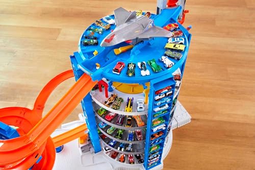 Hot Wheels Toy Car Track Set & 4 1:64 Scale Cars, Super Ultimate Garage, 3+ ft Tall with Motorized Gorilla & Storage for 140 Cars (Amazon Exclusive)
