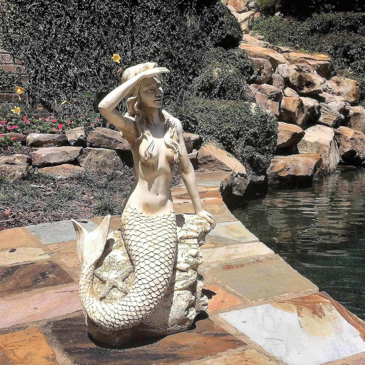 Homestyles Large 22 in. Classic Mermaid Sitting on Nautical Rock Looking Out to Sea Antique White Finish Beach and Pool Statue