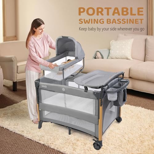 JOYMOR 7 in 1 Bedside Bassinet with Changing Table, All in One Nursery Center, Bedside Sleeper with Mattress, Sheet, Canopy, Storage Shelf and Hanging Toy,Gray
