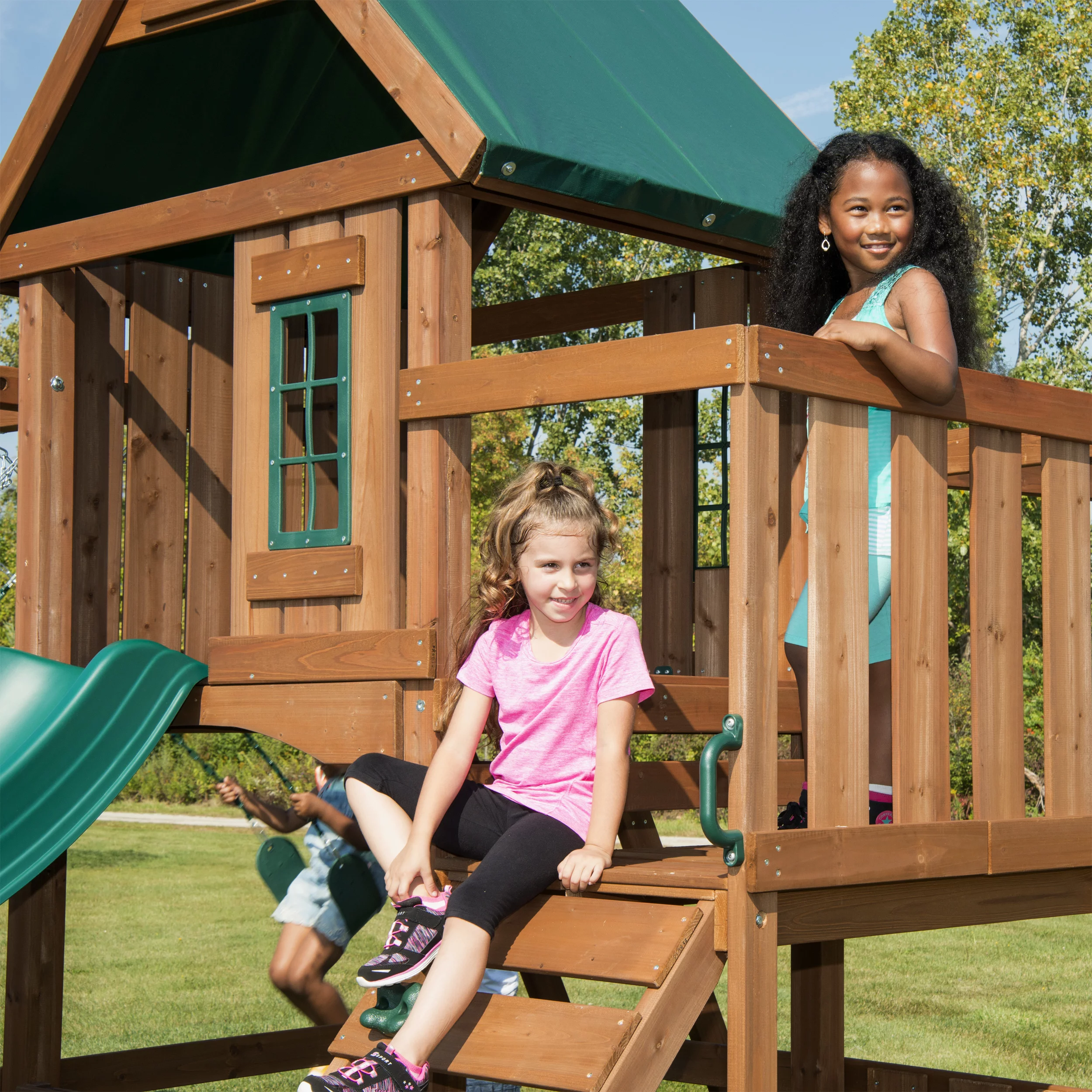 Swing-N-Slide Knightsbridge Wooden Backyard Swing Set with Alpine Wave Slide, Glider Swing, and Rock Climbing Wall