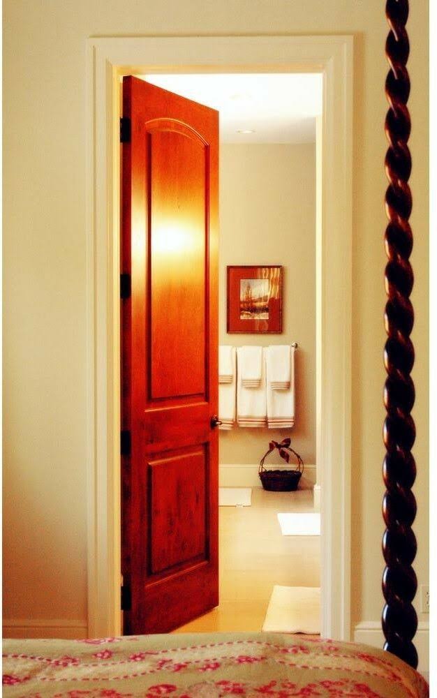 Krosswood Doors 28 in. x 80 in. Rustic Knotty Alder 2-Panel Top Rail Arch Solid