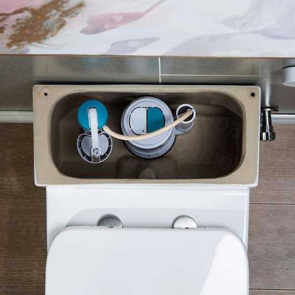 Woodbridge 1-piece 1.28 GPF Conserver High Efficiency Dual Flush All-in-One Toilet with Soft Closed Seat Included in White - Shop Hardware Tools Online Store