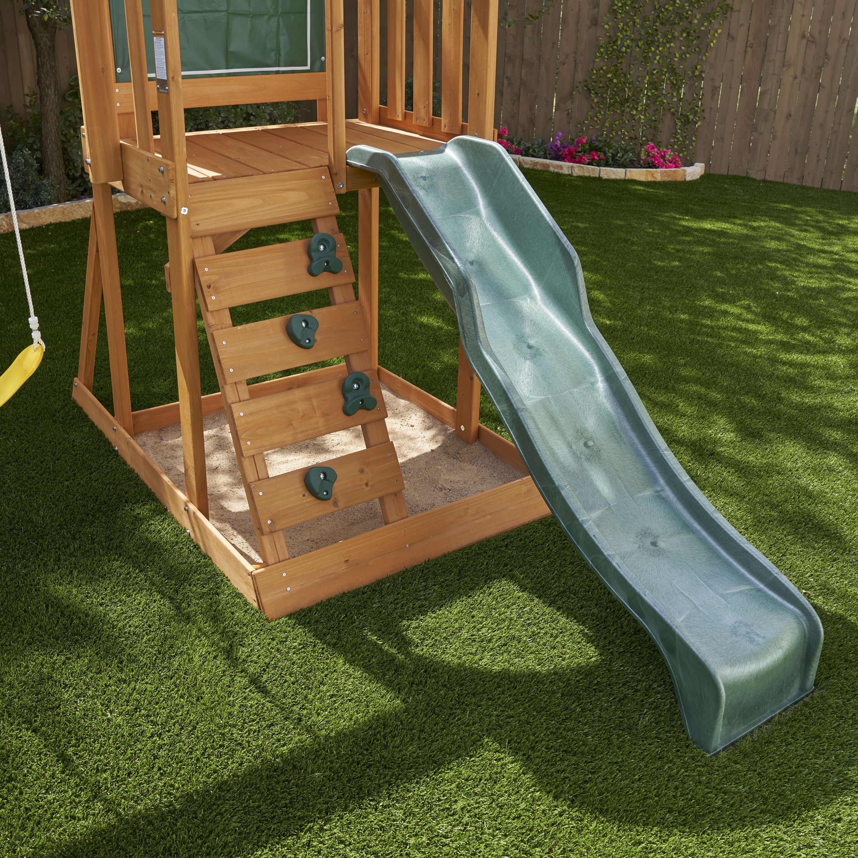 KidKraft Ainsley Wooden Outdoor Swing Set with Slide and Rock Wall