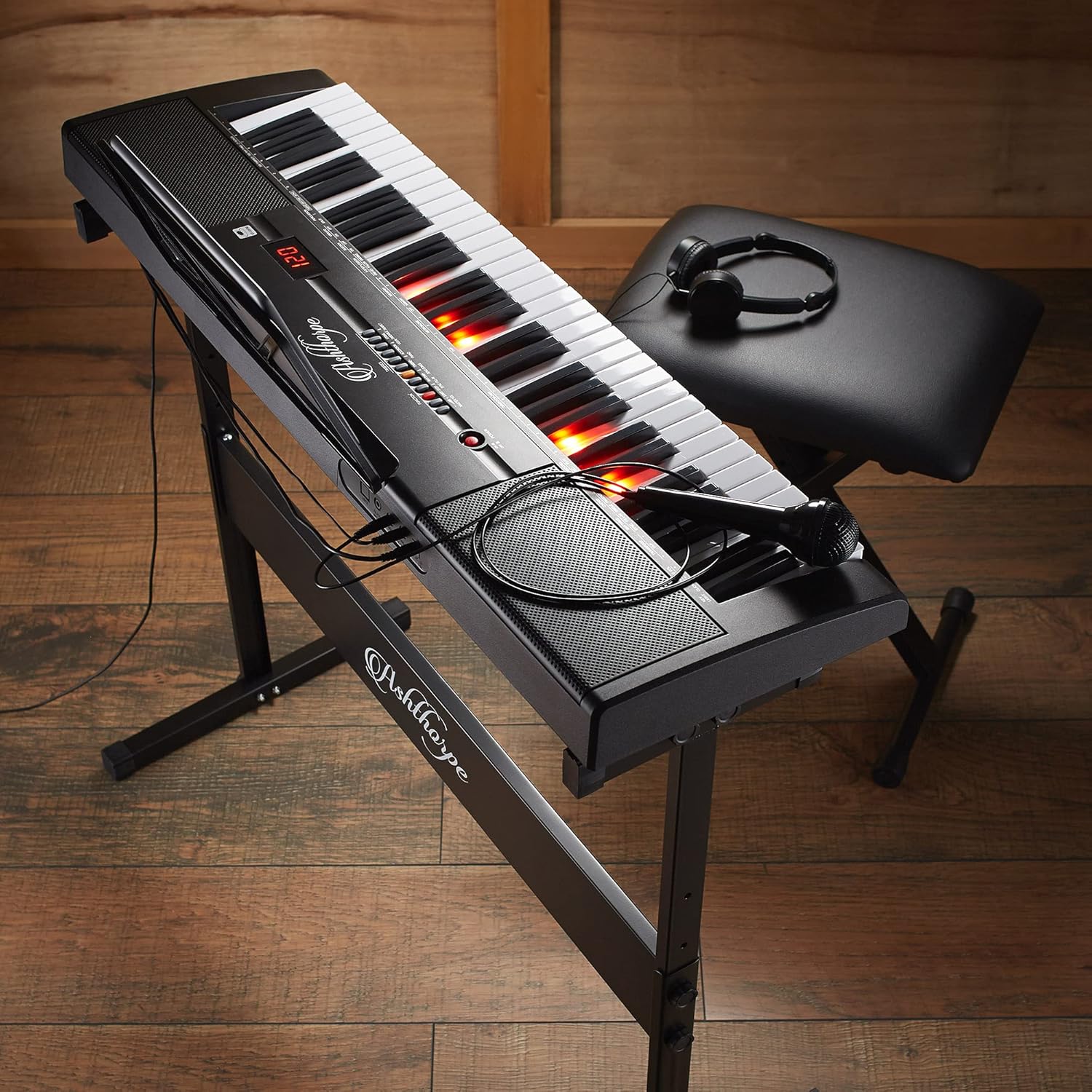 Ashthorpe 61-Key Digital Electronic Keyboard Piano with Light Up Keys, Includes Stand, Bench, Headphones, Mic and Keynote Stickers