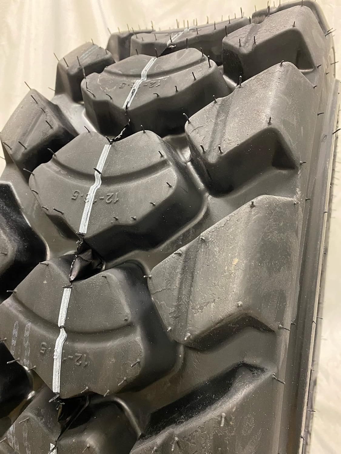 12-16.5, 12x16.5 ROAD CREW 14 Ply OZKA KNK66 Bobcat and pay loader Tires