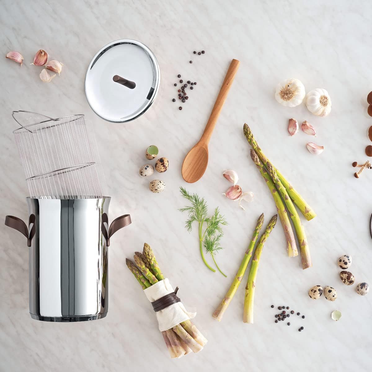 Alessi PU309 edo Asparagus steamer with basket and lid in 18/10 stainless steel. Handles in 18/10 stainless steel with PVD coating, brown. Magnetic steel bottom suitable for induction cooking.