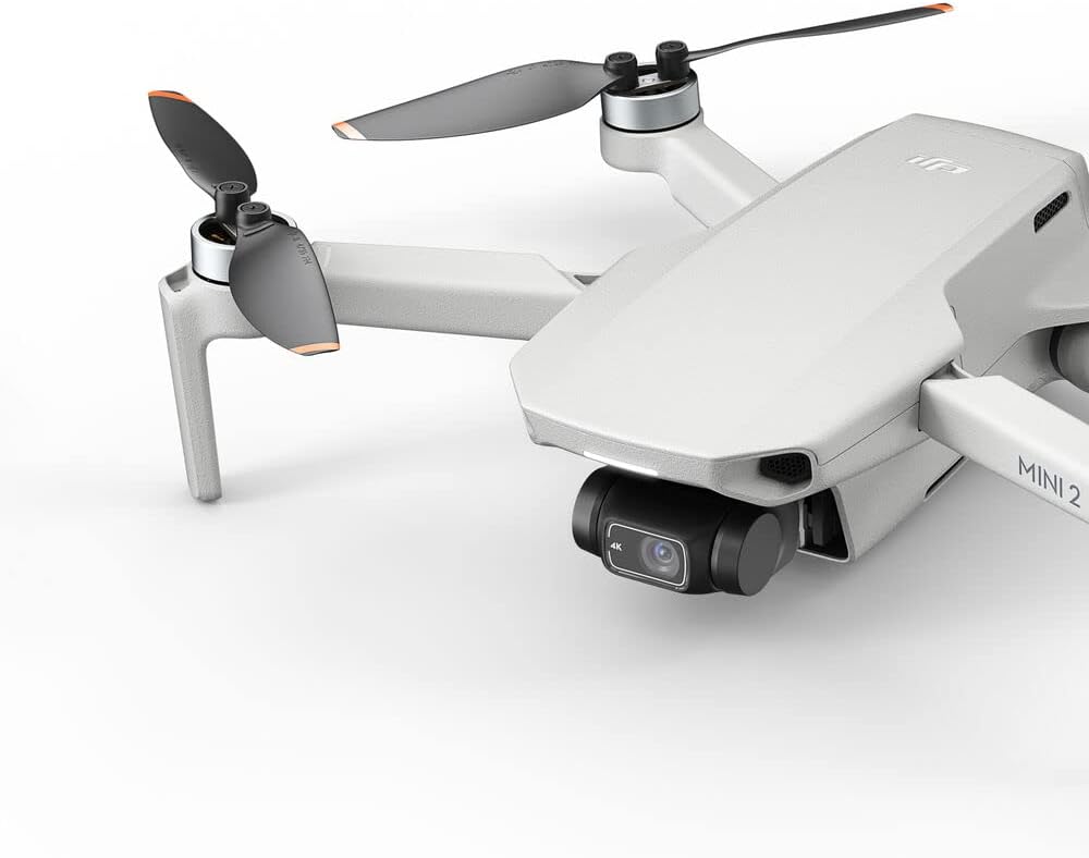 DJI Mini 2 Fly More Combo - Drone Quadcopter, Ultralight & Foldable 3-Axis Gimbal with 4K Camera, 12MP Photos with 64GB SD Card + Backpack + Landing Pad + VR Goggles + More (CP.MA.00000306.01)