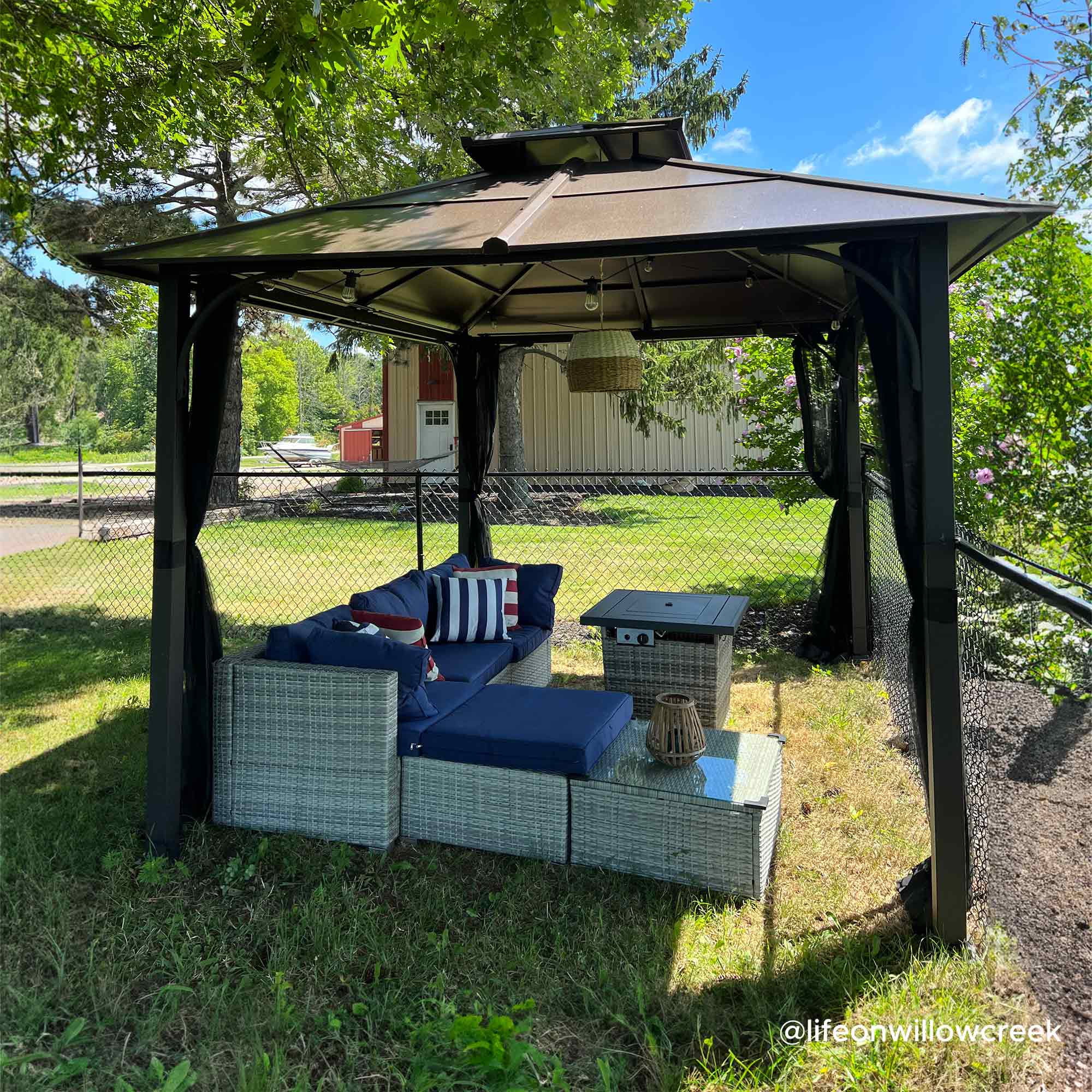 Sunjoy Lindsay Outdoor Patio 10x12 ft. Brown Steel Frame 2-Tier Hardtop Roof Gazebo with Ceiling hook and Netting