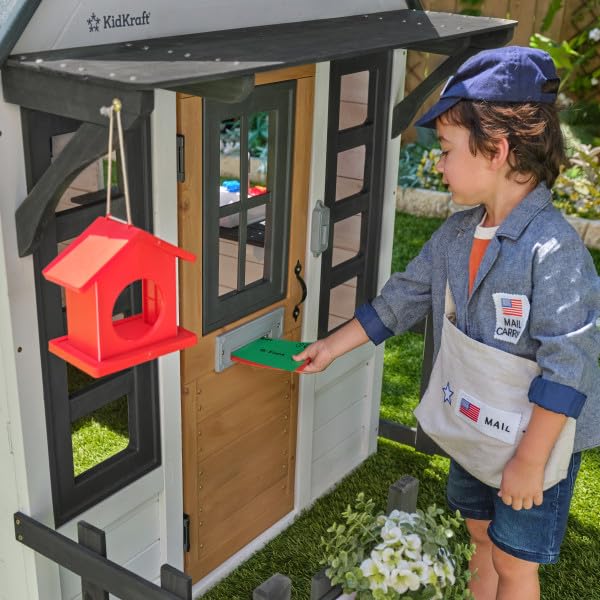 KidKraft Riverscape Wooden Playhouse with Working Doorbell, Fence, Kitchen and Pet Door