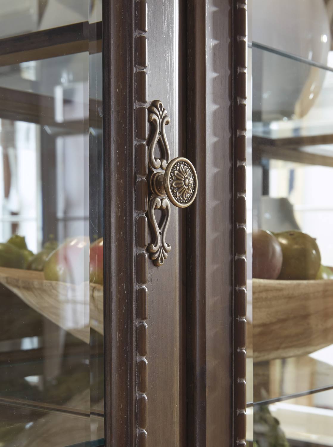 Signature Design by Ashley Charmond Dining Room China, Brown