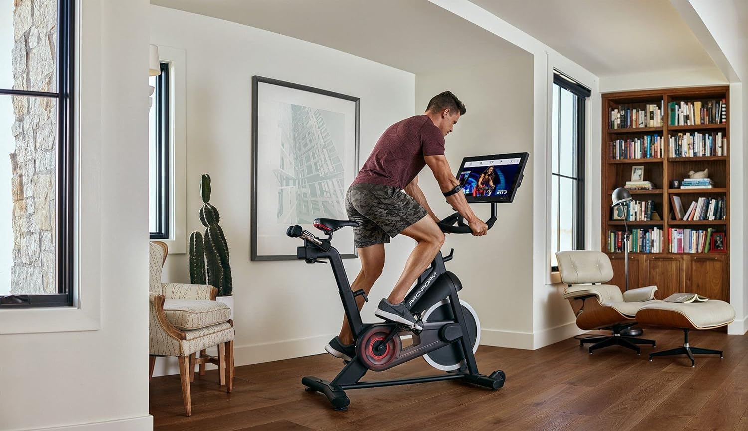Proform Studio 22 Pro Exercise Bike with 22” HD Touchscreen and 24 resistance levels,Two 3 lb dumbbells for workout, 30 Day iFIT Membership - Black