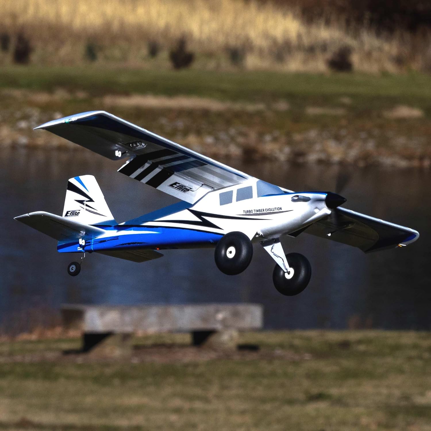 E-flite RC Airplane UMX Turbo Timber Evolution BNF Basic Transmitter Battery and Charger Not Included with AS3X and Safe EFLU8950 Airplanes B&F Electric