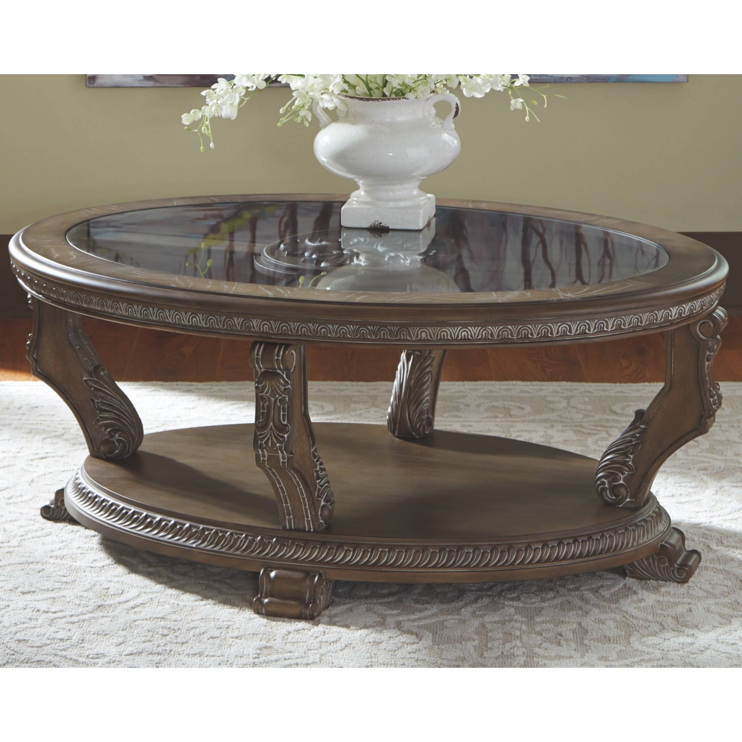 Signature Design by Ashley Charmond Brown Oval Cocktail Table