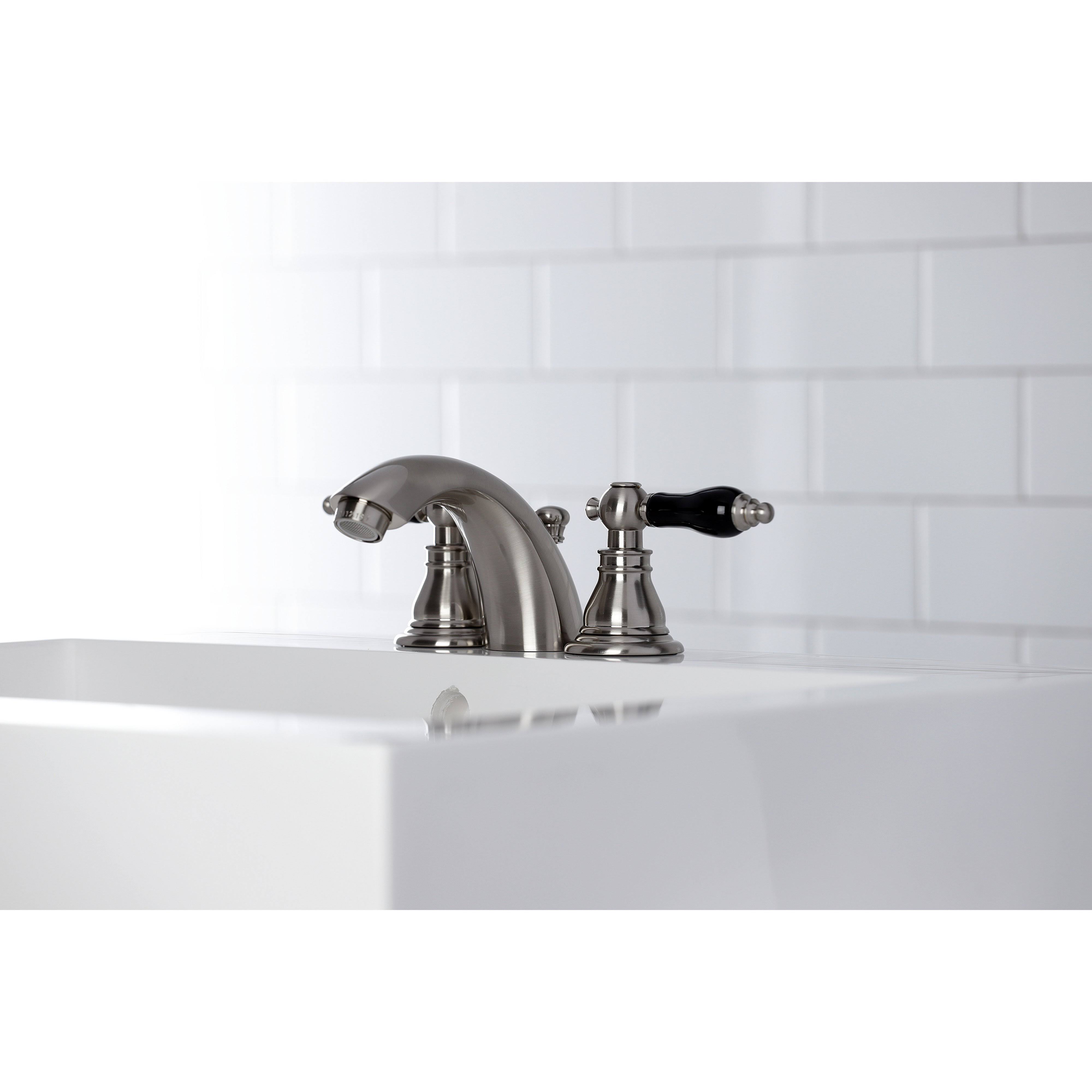 Kingston Brass KB952AKL Duchess Widespread Bathroom Faucet with Plastic Pop-Up Polished Brass