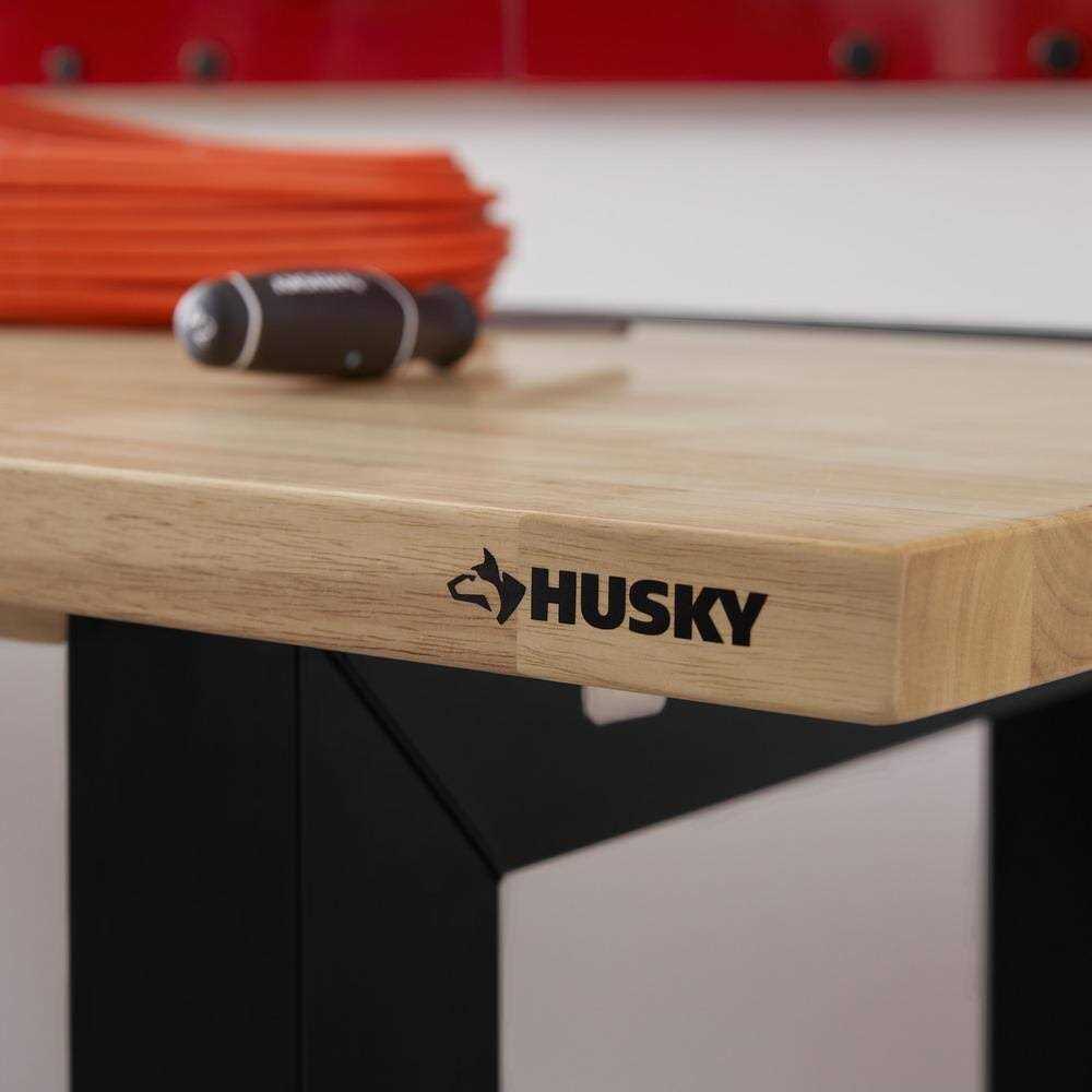 Husky Ready-To-Assemble 6 ft. Folding Adjustable Height Solid Wood Top Workbench in Black