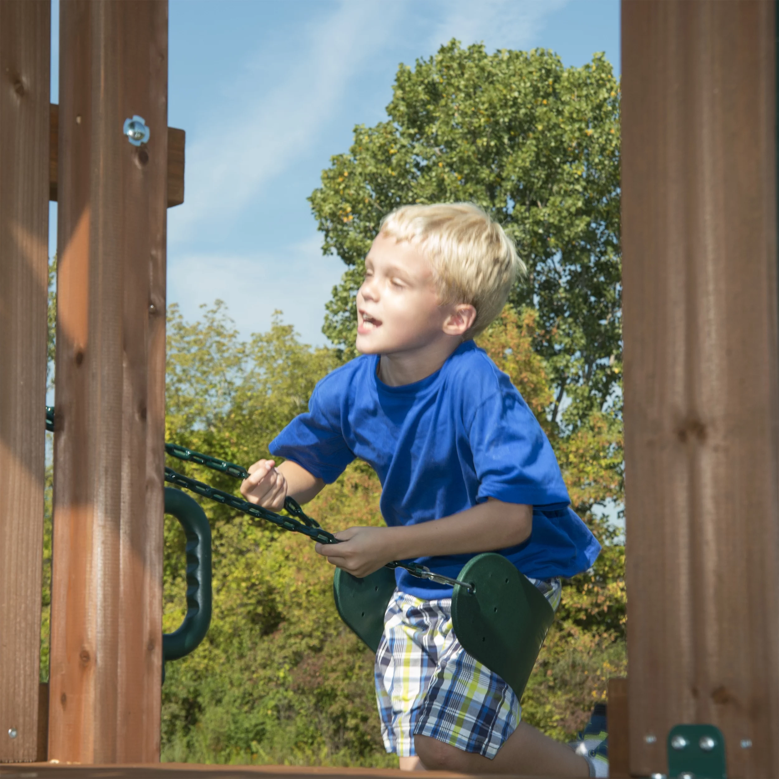 Swing-N-Slide Knightsbridge Wooden Backyard Swing Set with Alpine Wave Slide, Glider Swing, and Rock Climbing Wall
