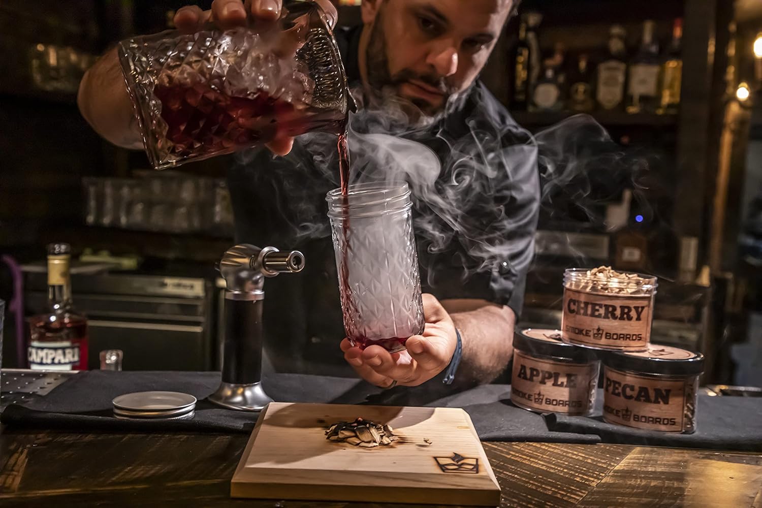 Smoked Cocktail Kit. The only Complete 7 Piece Home Bartender Kit with Carrying case and Torch Included! Handcrafted White Oak Smoking Board with 3 Different Wood Chips Including Mason jar and case.