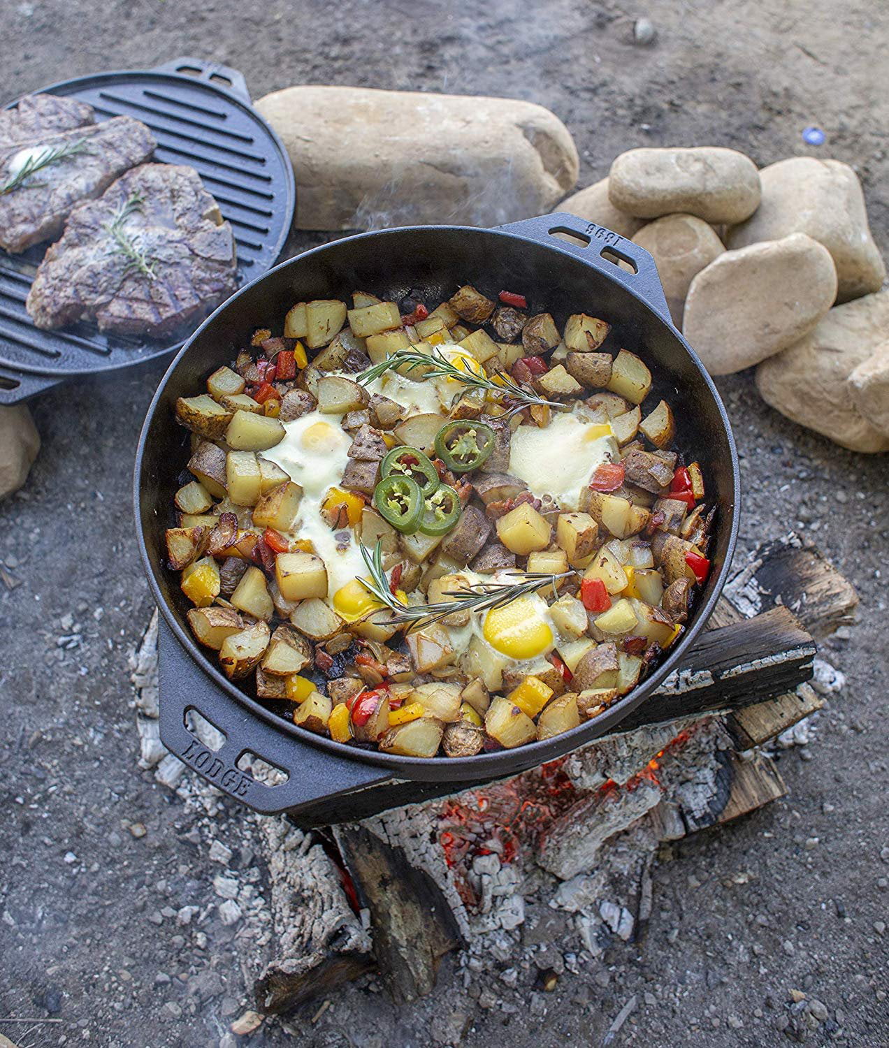 Lodge Cast Iron Cook-It-All Kit. Five-Piece Cast Iron Set includes a Reversible Grill/Griddle 14 Inch, 6.8 Quart Bottom/Wok, Two Heavy Duty Handles, and a Tips & Tricks Booklet.