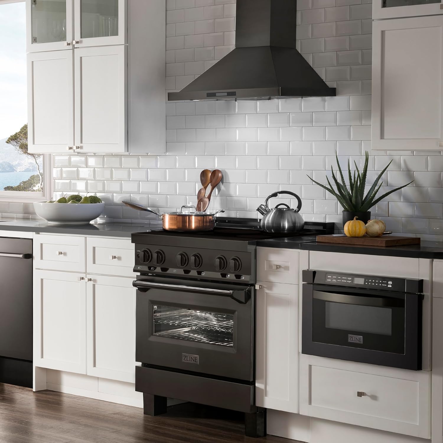 ZLINE 36" 4.6 cu. ft. Induction Range with a 4 Element Stove and Electric Oven in Black Stainless Steel (RAIND-BS-36)