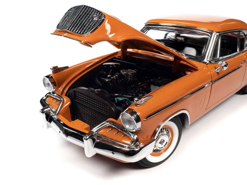 1957 Studebaker Gold Hawk Coppertone Orange and White 1/18 Diecast Model Car by Autoworld