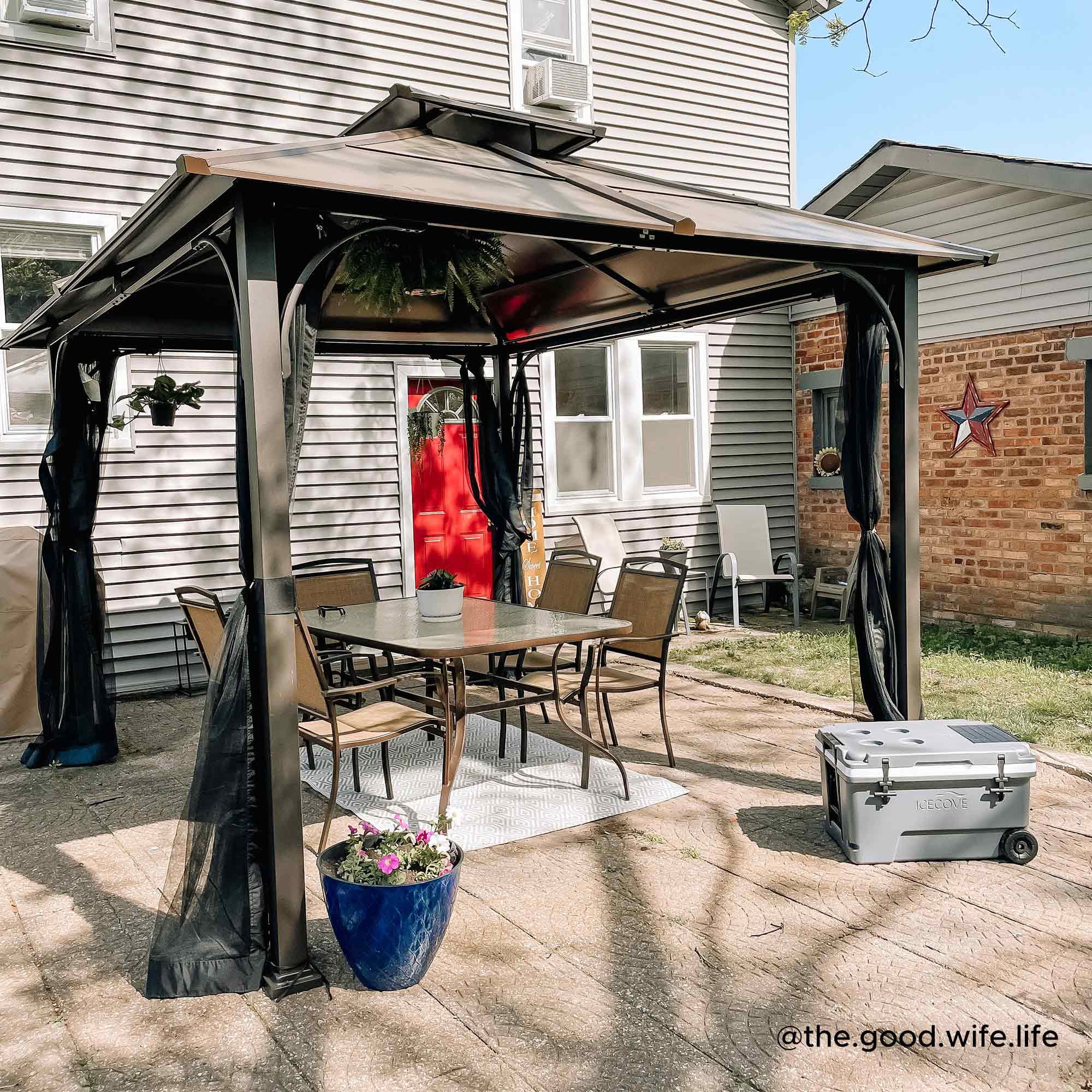 Sunjoy Lindsay Outdoor Patio 10x12 ft. Brown Steel Frame 2-Tier Hardtop Roof Gazebo with Ceiling hook and Netting