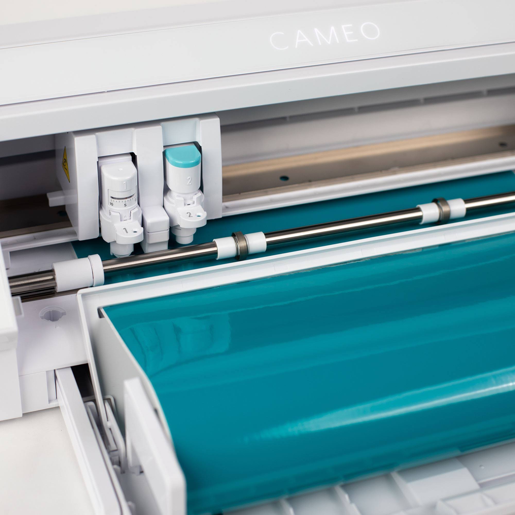 Silhouette White Cameo 4 with 26 Oracal Glossy Sheets, Guides, 24 Sketch Pens, and More