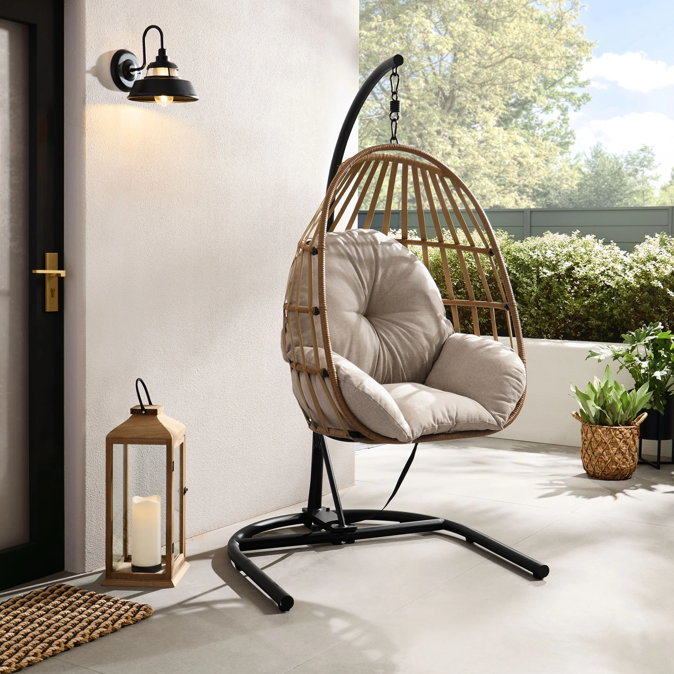 Mainstays Wicker Outdoor Patio Hanging Egg Chair with Beige Olefin Cushion and Black Metal Stand