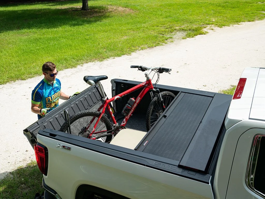 Roll-N-Lock by RealTruck M-Series Retractable Truck Bed Tonneau Cover Compatible with Select 2019-2023 Dodge Ram 1500 w/RamBox w/ Multi-Function (Split) Tailgate 5' 7" Bed (67.4")