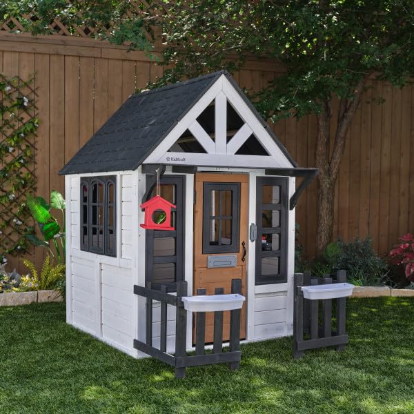 KidKraft Riverscape Wooden Playhouse with Working Doorbell, Fence, Kitchen and Pet Door