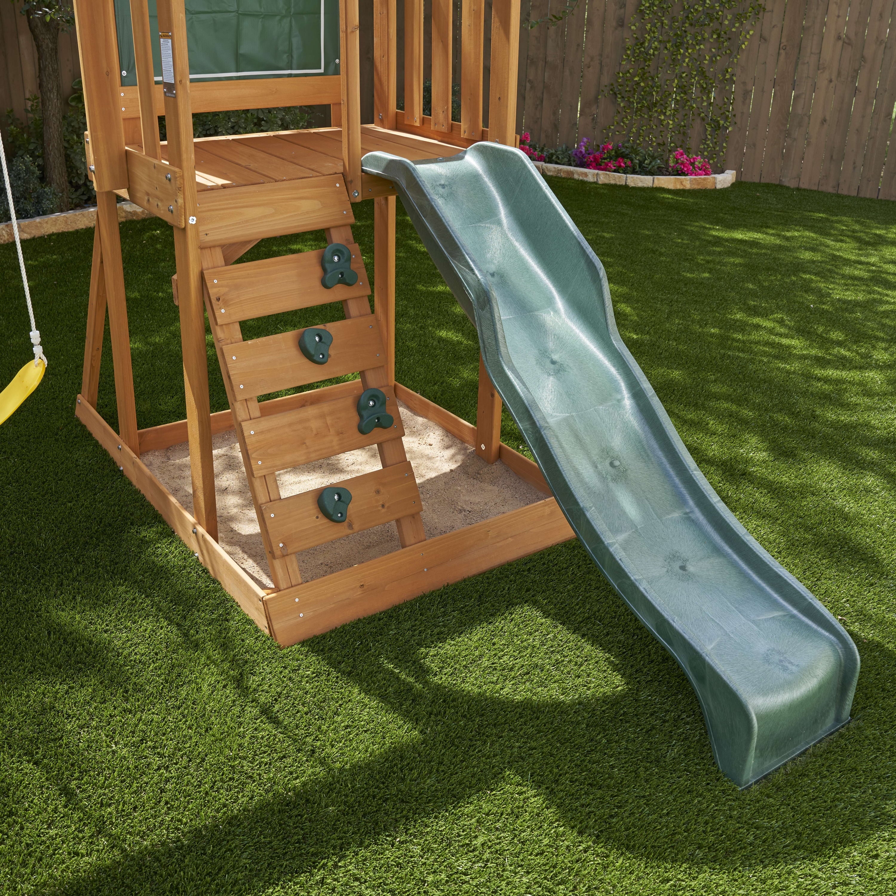 KidKraft Ainsley Wooden Outdoor Swing Set with Slide and Rock Wall