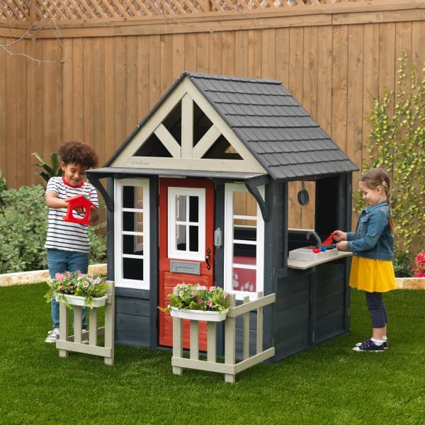 KidKraft Riverscape Wooden Playhouse with Working Doorbell, Fence, Kitchen and Pet Door