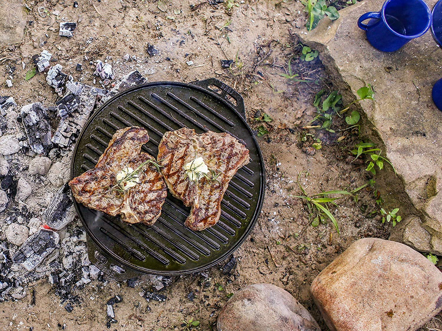 Lodge Cast Iron Cook-It-All Kit. Five-Piece Cast Iron Set includes a Reversible Grill/Griddle 14 Inch, 6.8 Quart Bottom/Wok, Two Heavy Duty Handles, and a Tips & Tricks Booklet.