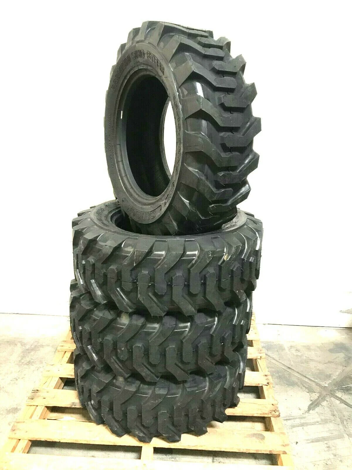 (4) Four- 12-16.5 Skid Steer 12Ply Tires Loader W/Rim Guard Heavy Duty