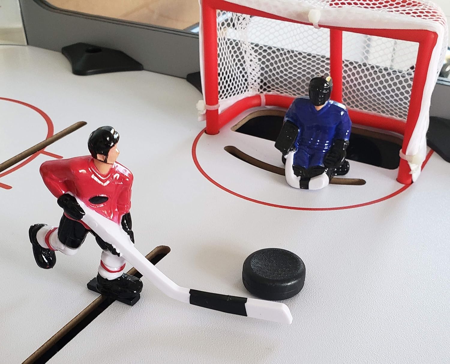 Mancave 40 Deluxe Rod Hockey Game Table. Head-to-Head Table Hockey Action with Electronic Scoring. Great Size, Durability & Easier for Kids to Play Than Dome Hockey.
