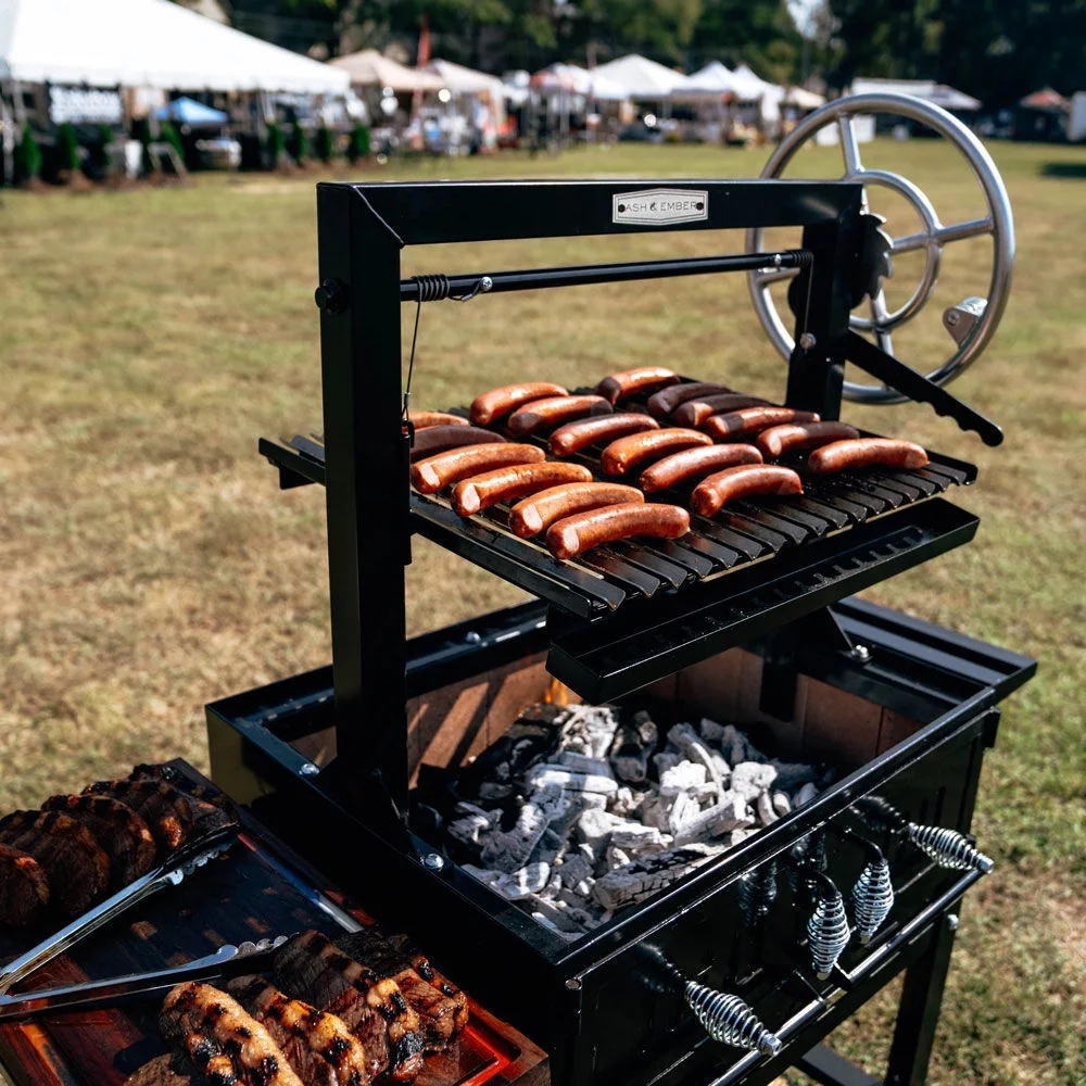 Ash & Ember Santa Maria Grill, Steel Wood & Charcoal Argentine Grill, Flywheel for Adjustable Grate Height, BBQ Grill with Ceramic Brick Lining, V-Grates & Grease Trap, Bottom & Side Shelves