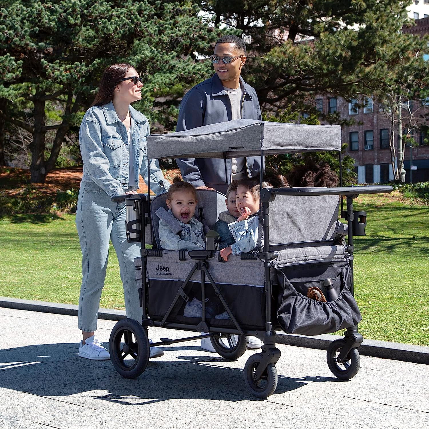 Jeep Wrangler Deluxe 4 Seater Stroller Wagon by Delta Children - Premium Quad Stroller Wagon for 4 Kids with Convertible Seats, Adjustable Push/Pull Handles, Removable Canopy & Flat Fold, Grey