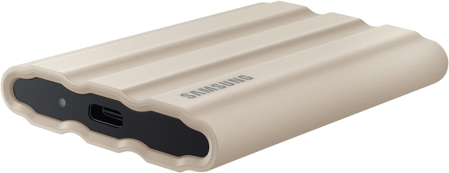 Samsung MU-PE1T0K/AM T7 Shield Portable Solid State Drive 1TB 2022 - Beige Bundle with Converter Adapter Type C Adapter + Vivitar Hard Shell Case (White)