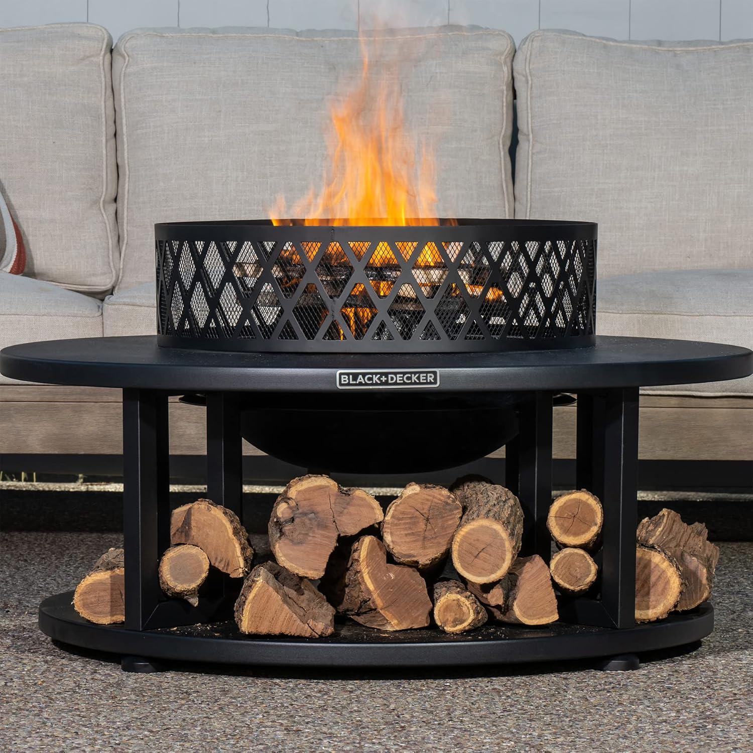 BLACK + DECKER 38" D Steel Wood burning fire pit with log storage area for entertaining backyard bonfires includes mesh lid and poker Black powder coated steel