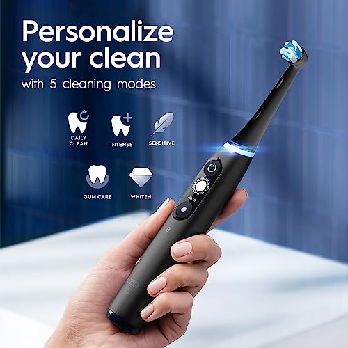 Oral-B iO Series 7 Rechargeable Electric Toothbrush with Visible Pressure Sensor to Protect Gums, 2 Minute Timer, 5 Cleaning Settings, 2 Replacement Toothbrush Heads, and Travel Case, Black