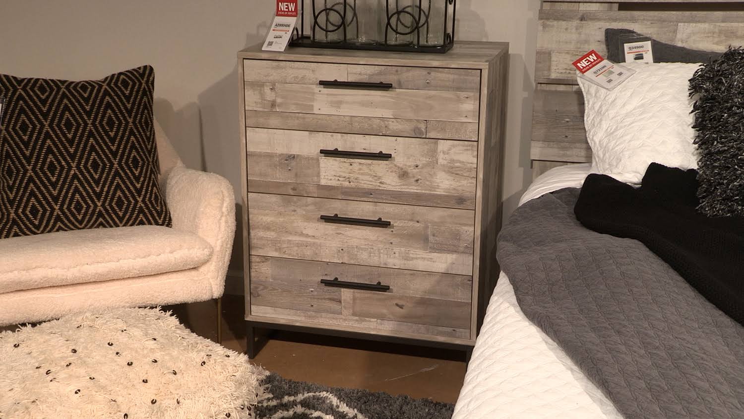 Signature Design Neilsville Whitewash 4-Drawer Chest by Ashley