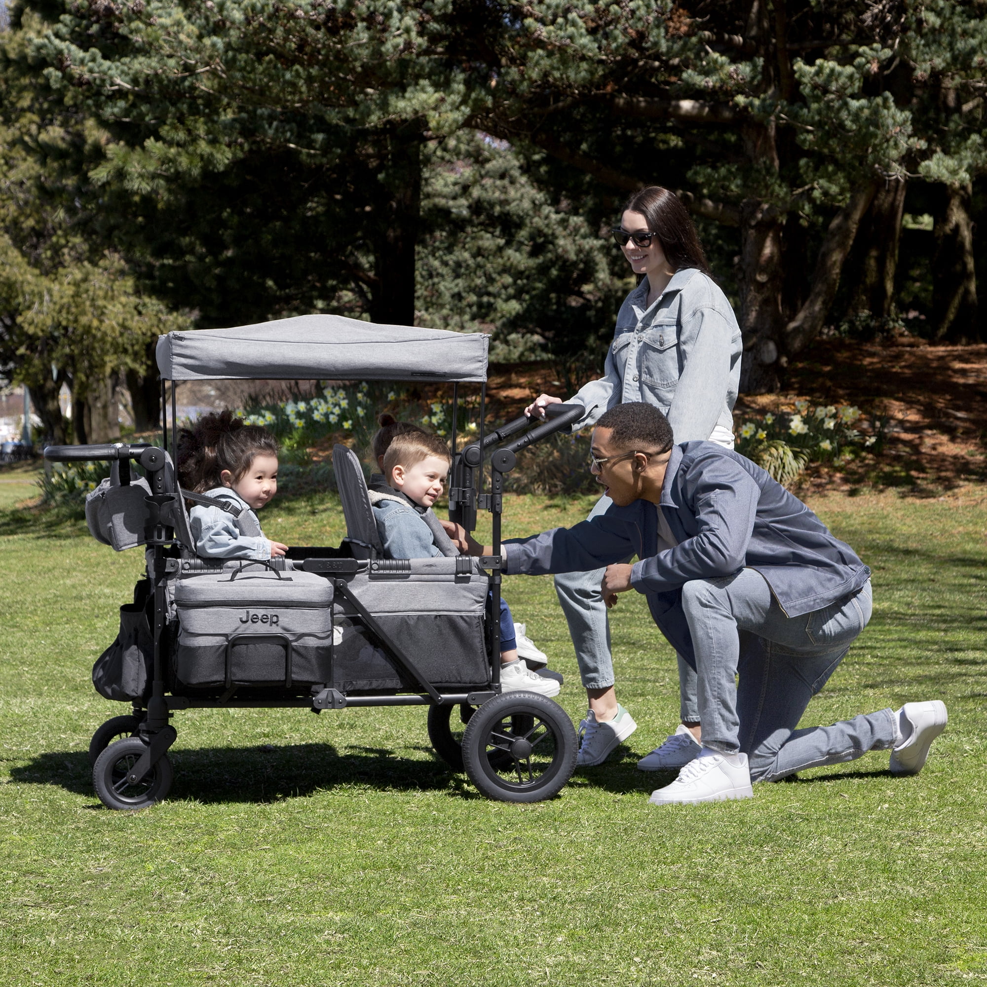 Jeep Wrangler Deluxe 4 Seater Stroller Wagon by Delta Children - Premium Quad Stroller Wagon for 4 Kids with Convertible Seats, Adjustable Push/Pull Handles, Removable Canopy & Flat Fold, Grey