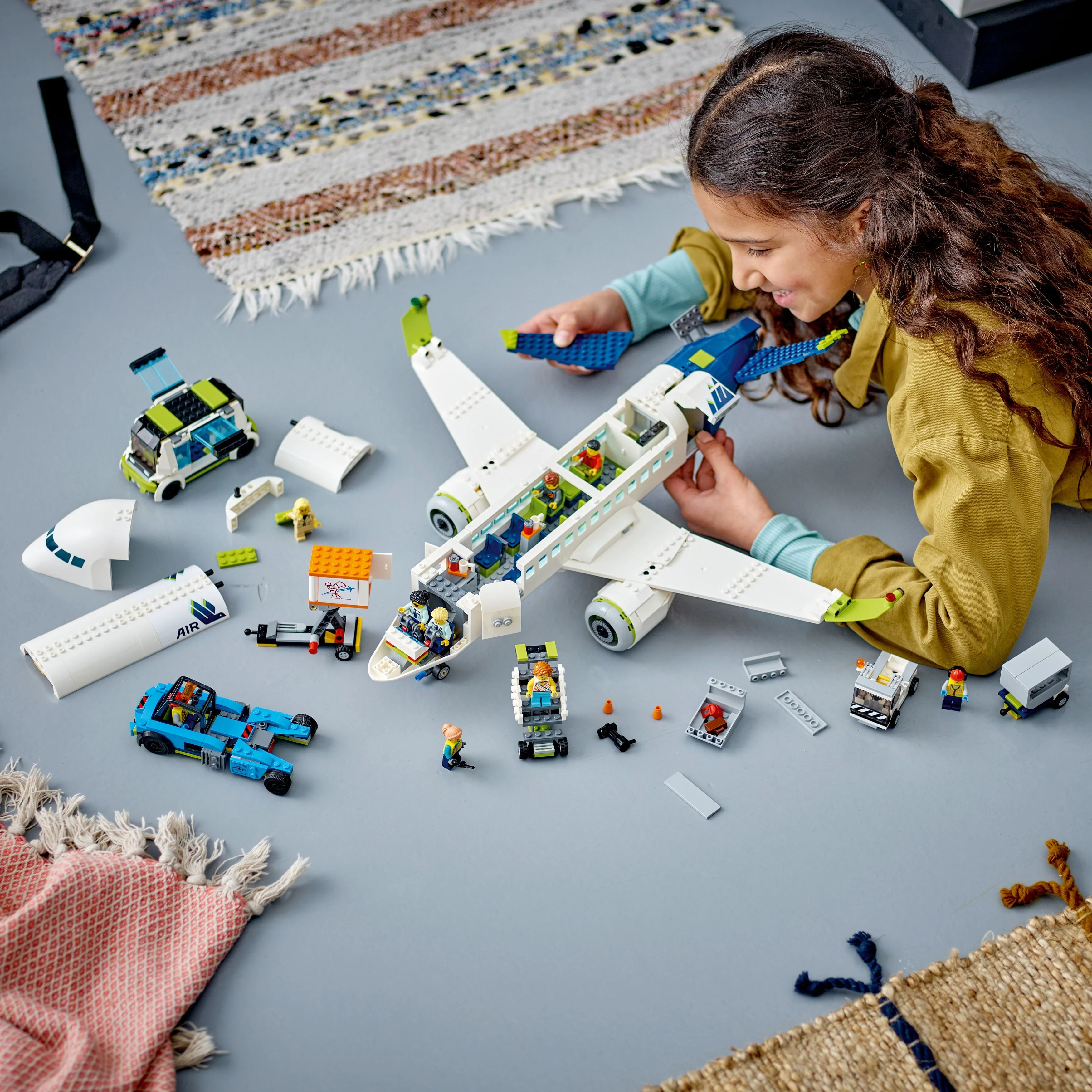 LEGO City Passenger Airplane 60367 Building Toy Set; Fun Airplane STEM Toy for Kids with a Large Airplane, Passenger Bus, Luggage truck, Container Loader, and 9 Minifigures