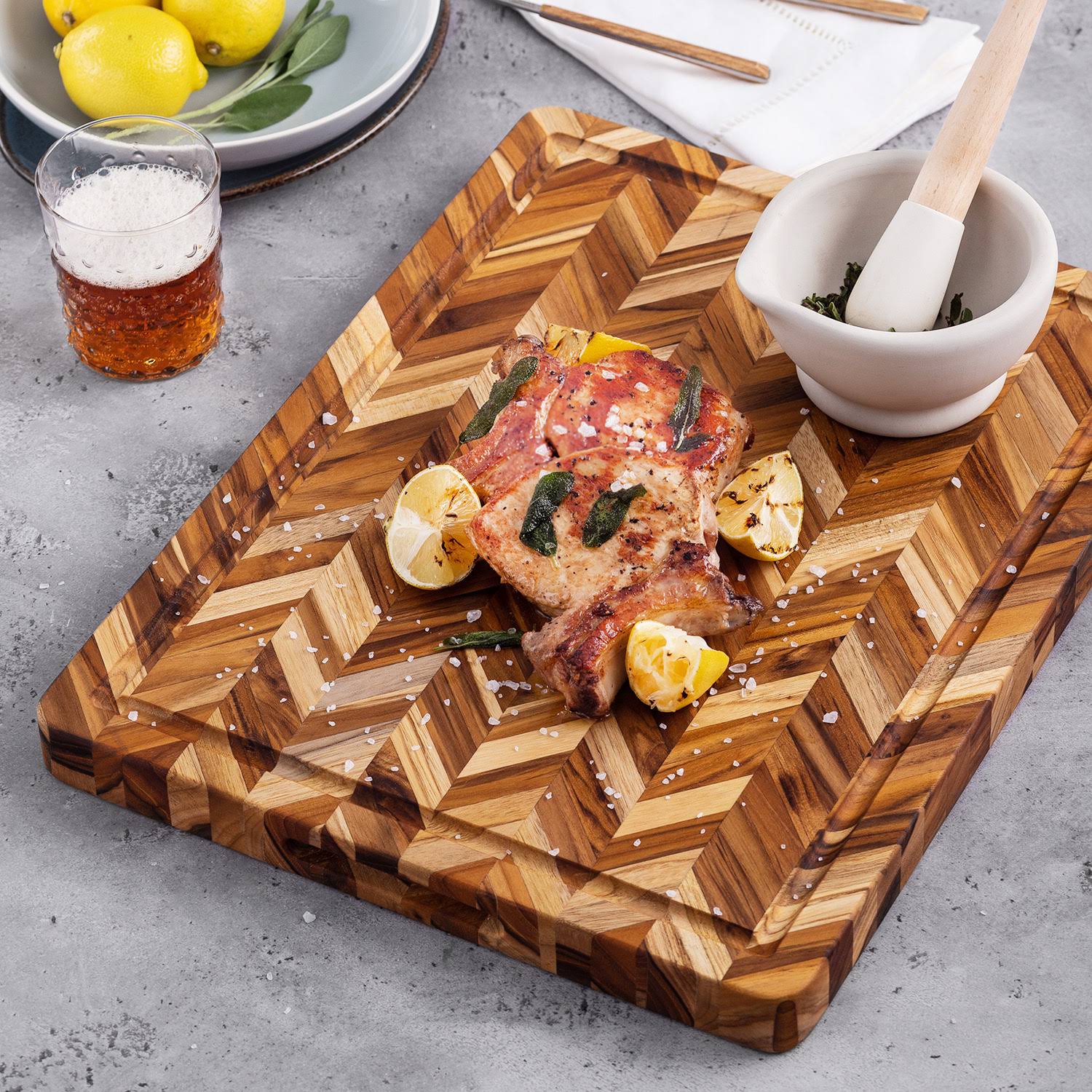 Teakhaus Reversible Cutting Board with Hand Grips u0026 Juice Canal