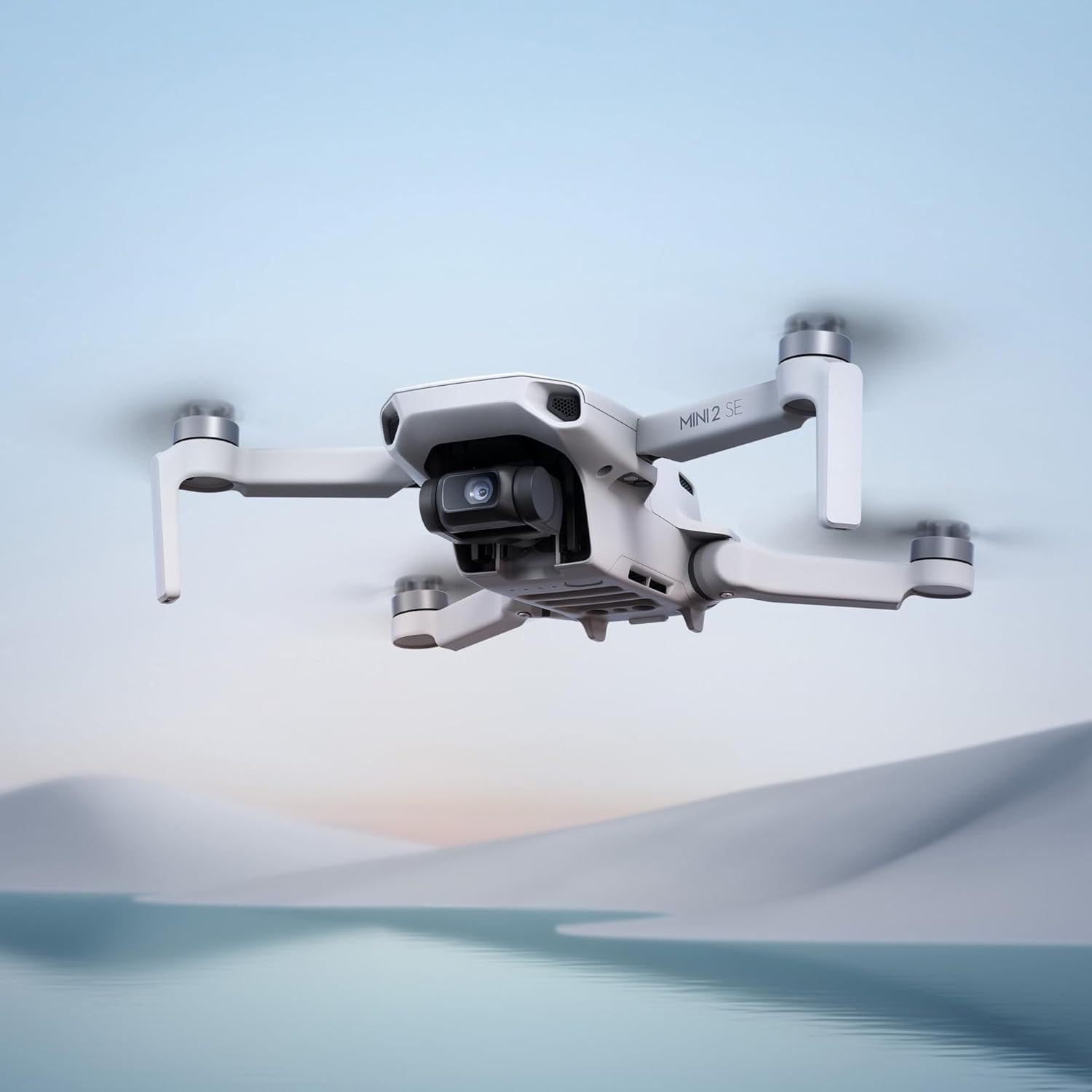 DJI Mini 2 SE Fly More Combo with 64GB Memory Card- Lightweight and Foldable Mini Camera Drone with 2.7K Video, Extra Batteries, 10km Video Transmission, and 31-min Flight Time (2 Items)