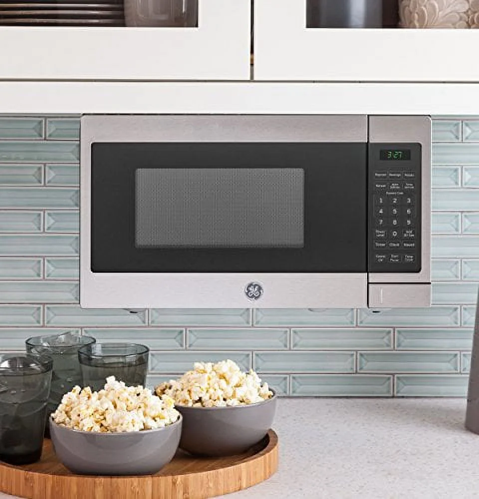 GE Countertop Microwave Oven| 0.7 Cubic Feet Capacity, 700 Watts | Kitchen Essentials for the Countertop | Stainless Steel