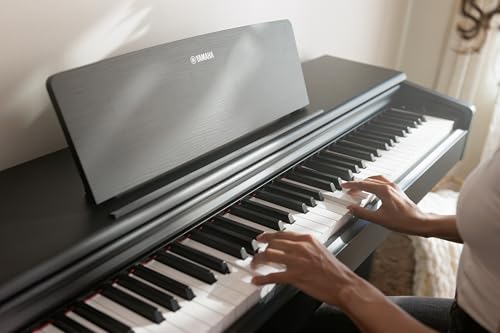 Yamaha Arius, 88-Key Weighted Action Digital Beginner and Intermediate Players, Dynamic Response, Grand Piano Sound, 3-Pedal Unit, Upright Design, Bench Included, Dark Rosewood (YDP105R)