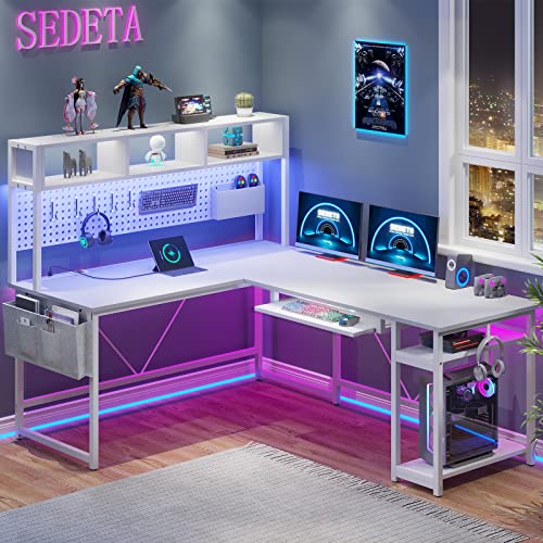 SEDETA L Shaped Gaming Desk, Reversible Computer Desk with Power Outlet and Pegboard, Gaming Desk with Led Lights, Keyboard Tray and Storage Bag for Home Office, Black