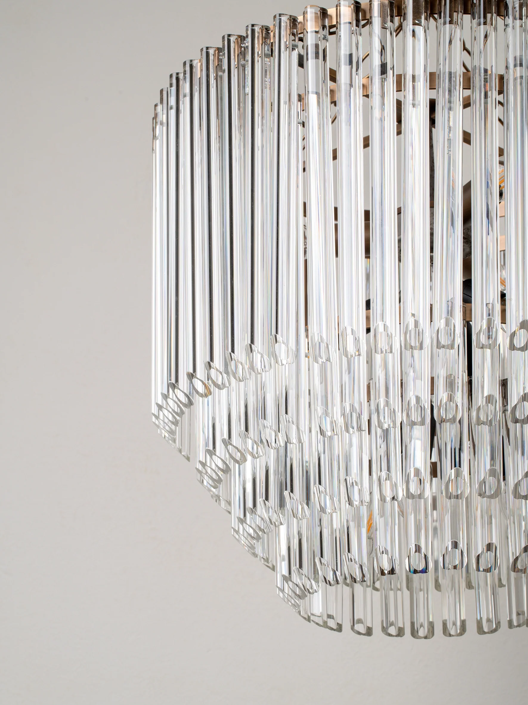 Petalia - 9 light aged brass and clear glass tube tall chandelier
